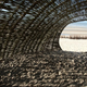 Illustration for article titled Artist creates 148-foot sandworm on the beach